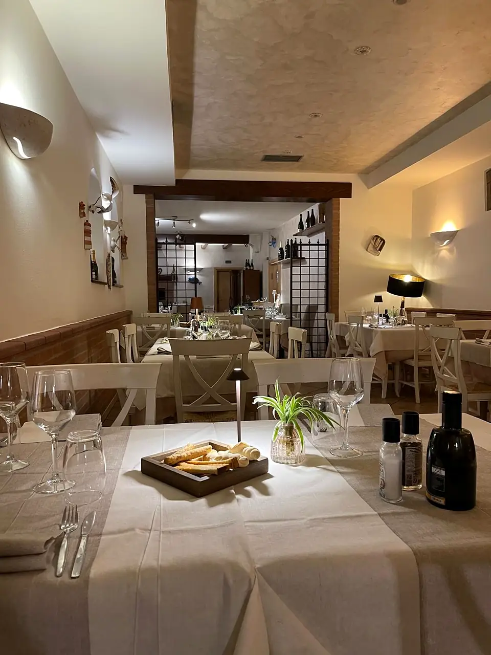 Orba Canocia's dining room set for dinner
